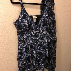 One piece Jaclyn Smith swimsuit with coverup.